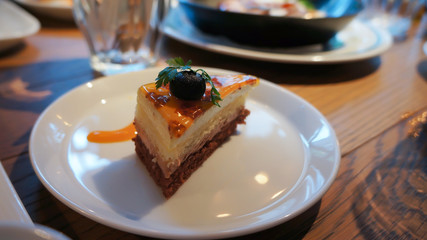 Cake after meal in cafe