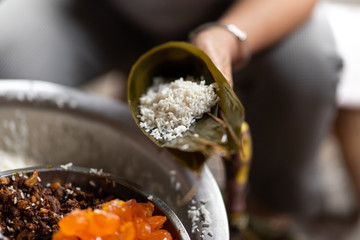 The process of making zongzi(traditional Chinese rice-pudding)