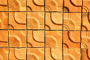 Brown baked clay brick wall