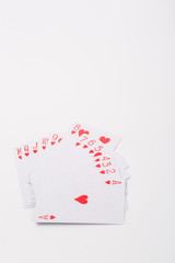 Fototapeta na wymiar Expanded playing cards on white background
