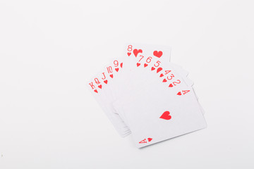 Expanded playing cards on white background