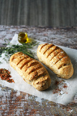 Homemade bread with Italian herbs and spices. Italian food.