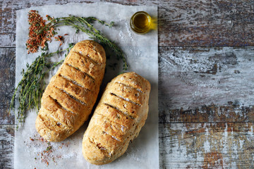 Homemade bread with Italian herbs and spices. Italian food.
