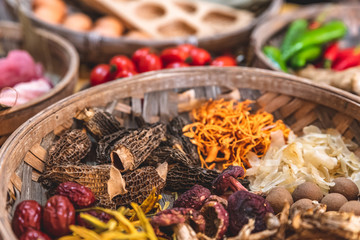 Fototapeta premium Wonderful ingredients, dried mushrooms in baskets