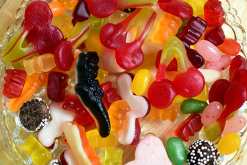 Multi-colored chewing marmalade of various shapes. Texture, background.