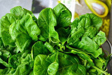 Spinach. Vitamins Raw food diet. Vegetarianism and veganism, healthy food, ingredient. Spinach background, close-up.