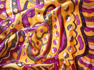 The texture of the fabric. Bright summer fabric made of natural silk. Silk scarf, scarf.