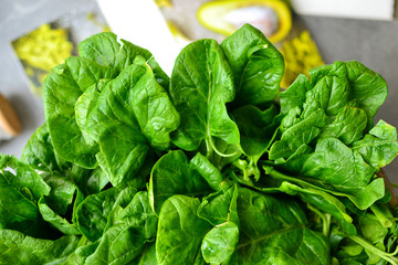 Spinach. Vitamins Raw food diet. Vegetarianism and veganism, healthy food, ingredient. Spinach background, close-up.