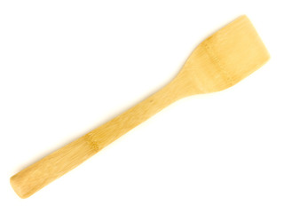 Wooden cooking utensils on white background