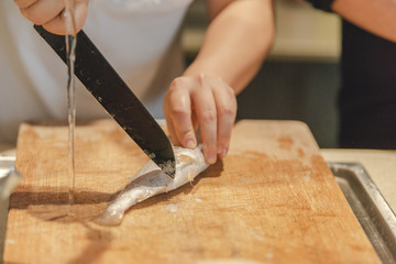 A busy hand in the kitchen