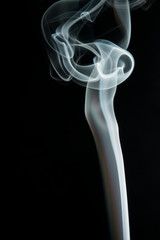 White smoke on black background