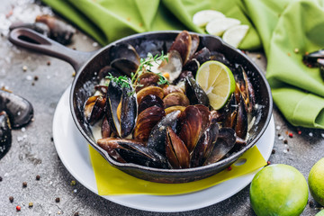 Baked Mediterranean mussels with creamy lime sauce.