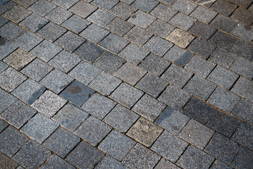 Small stone pavement of city sidewalk
