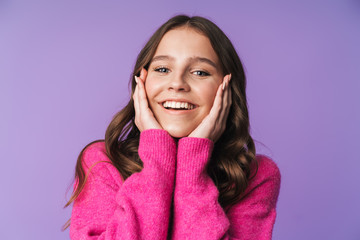 Image of young beautiful woman smiling and touching her face