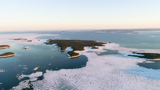 Flying above ice, top aerial view of arctic ice floes