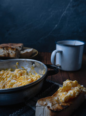 scrambled egg at breakfast with a cup of tea