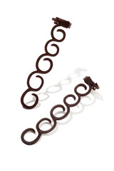 Close-up shot of two brown French braids makers. The braiding tools are isolated on the white background with shadows. 