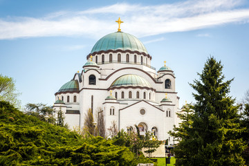 Fototapeta na wymiar Saint Sava orthodox church in a sunny spring day. Belgrade, Serbia. The largest church in the Balkans. 