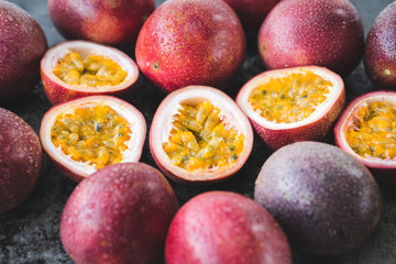 Fresh passion fruits-Passion fruit slices-Healthy fruit - obrazy, fototapety, plakaty
