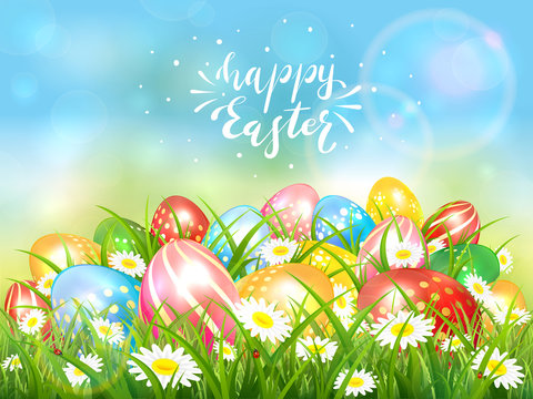 Blue Nature Background with Colorful Easter Eggs