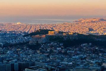 ATHENS, GREECE, December 22, 2013: Parthenon and Acropolis at dawn at different heights of the sun,...