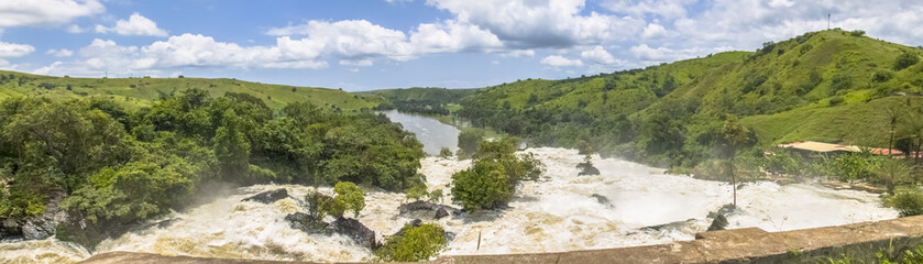 Naklejka na ściany i meble Panoramic view of the Binga waterfalls on Keve river, tropical banks landscape