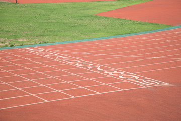 Red rubber track on the playground