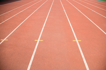Red rubber track on the playground