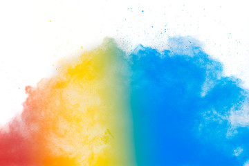 Colorful background of pastel powder explosion.Multi colored dust splash on white background.Painted Holi.