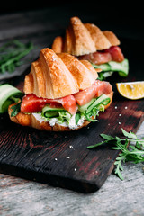 Croissant with salmon, cream cheese and lettuce