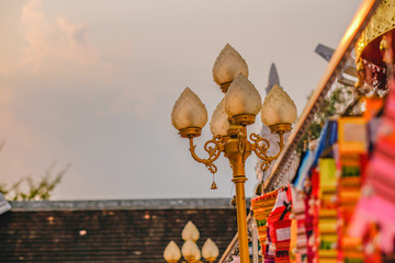 Glass lotus lamp And the light from the sun at Wat Phra That Chae Haeng