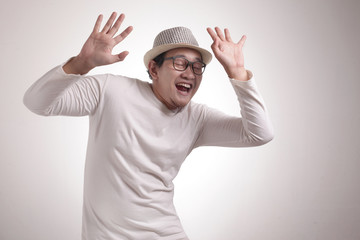 Happy Funny Asian Man Dancing Full of Joy, Winning