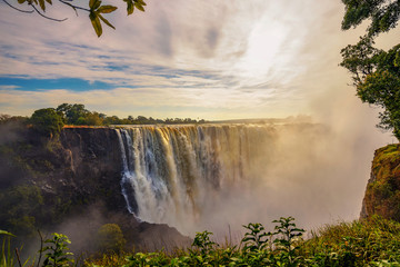 Sunset at the Victoria Falls on Zambezi River in Zimbabwe