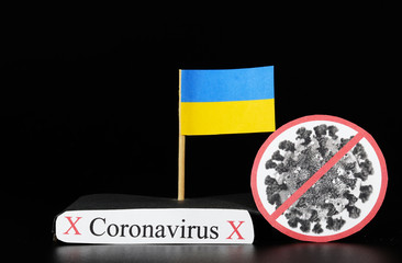 National flag of Ukraine with cell of covid-19 and word coronavirus. Fast spreading disease...