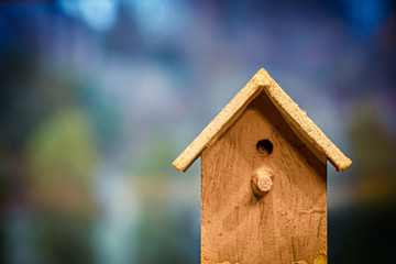 Obraz na płótnie Canvas Small wooden bird house