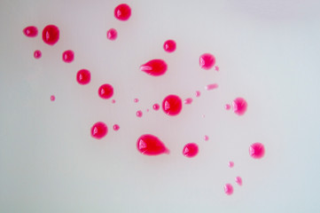 Red blood drops on the white