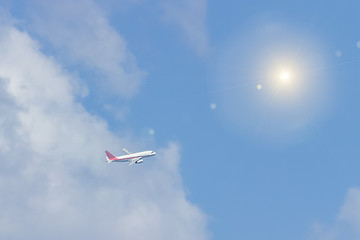 The plane is flying in the clouds, copy space for design. blurring the photo is my idea