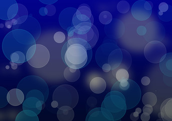 Abstract Bokeh blurred color light on blue background, concept for background or wallpaper
