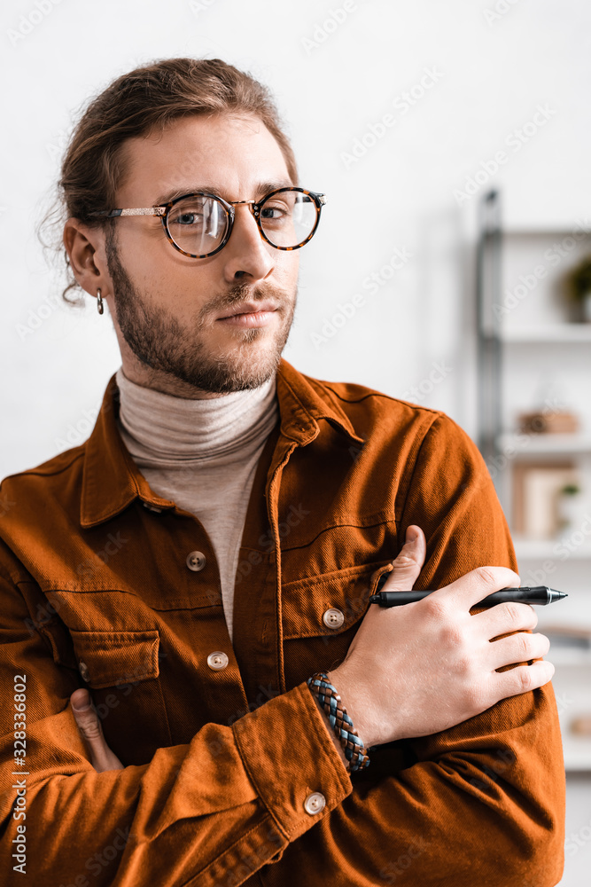 Aufkleber handsome 3d visualizer holding stylus of graphics tablet and looking at camera