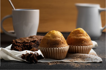 Muffins and brownie with coffee