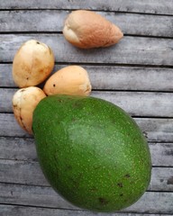 seeds and avocado on a bamboo board