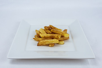French fries potatoes isolated on white background