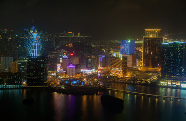 Fototapeta na wymiar Macau with Cathedral reflected in water in China 