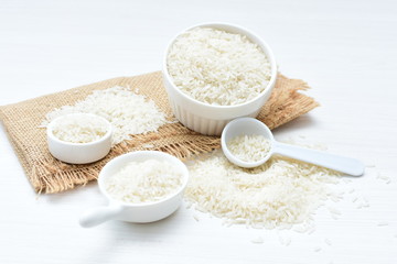 Natural raw white rice grains, on display in bowl
