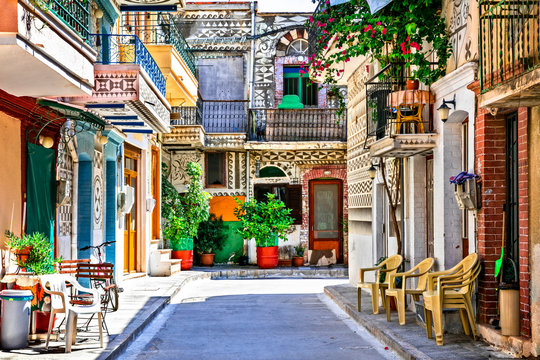 Fototapeta Most beautiful villages of Greece - unique traditional  Pyrgi in Chios island known as the "painted village"