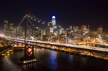 Fototapeta na wymiar San Francisco downtown buildings skyline night bay bridge
