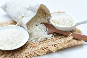 Natural raw white rice grains, on display in bowl
