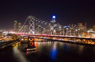 Obraz na płótnie Canvas San Francisco downtown buildings skyline night bay bridge