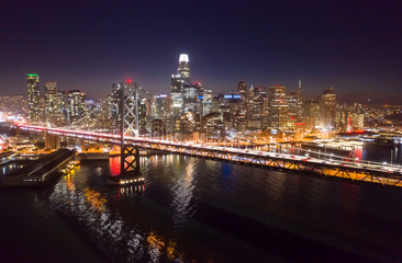 Fototapeta na wymiar San Francisco downtown buildings skyline night bay bridge