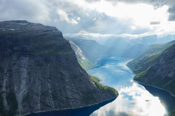 Beautiful fjord in Norway with amazing sun rays. View from the top